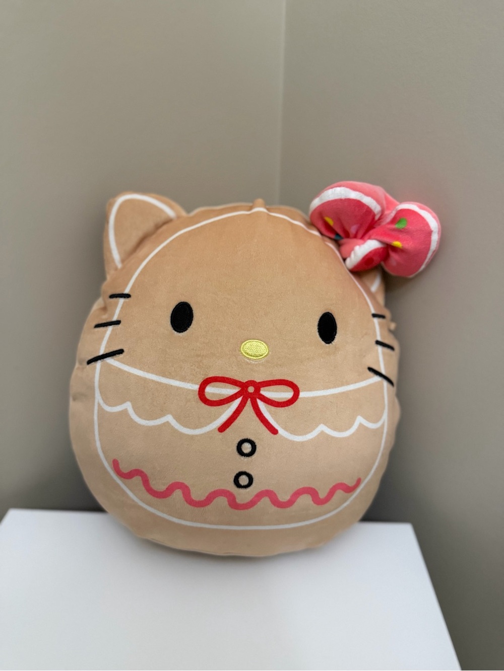 Plush Hello Kitty Bow Gingerbread Pillow in Tan with Pink Accent